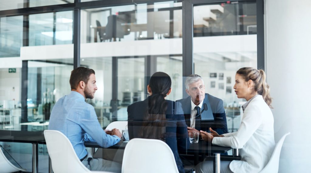 Group of businesspeople having a meeting in an office